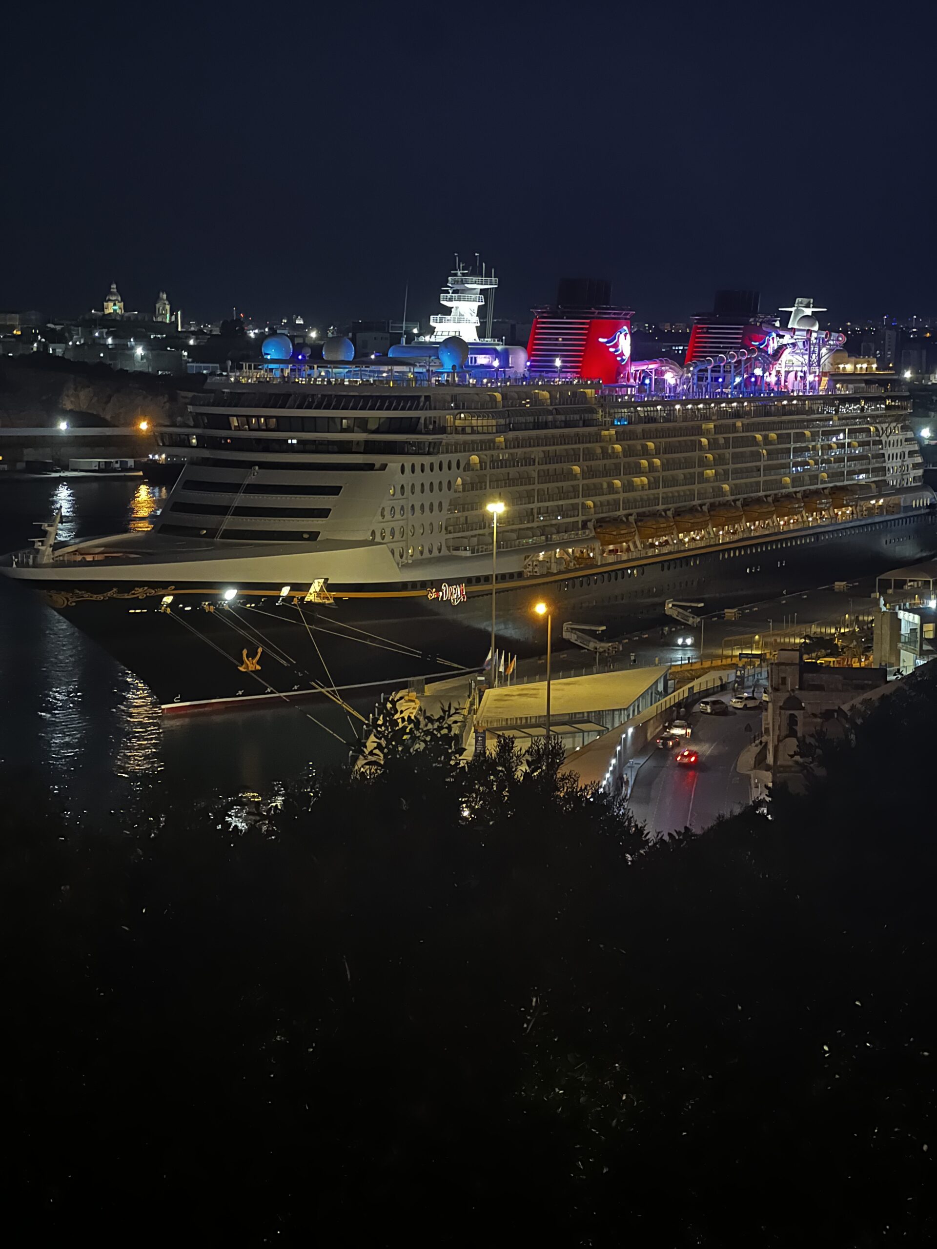 Disney Dream in port in Valetta, Malta. Disney sits in its own cruise line tier between mainstream and premium lines.