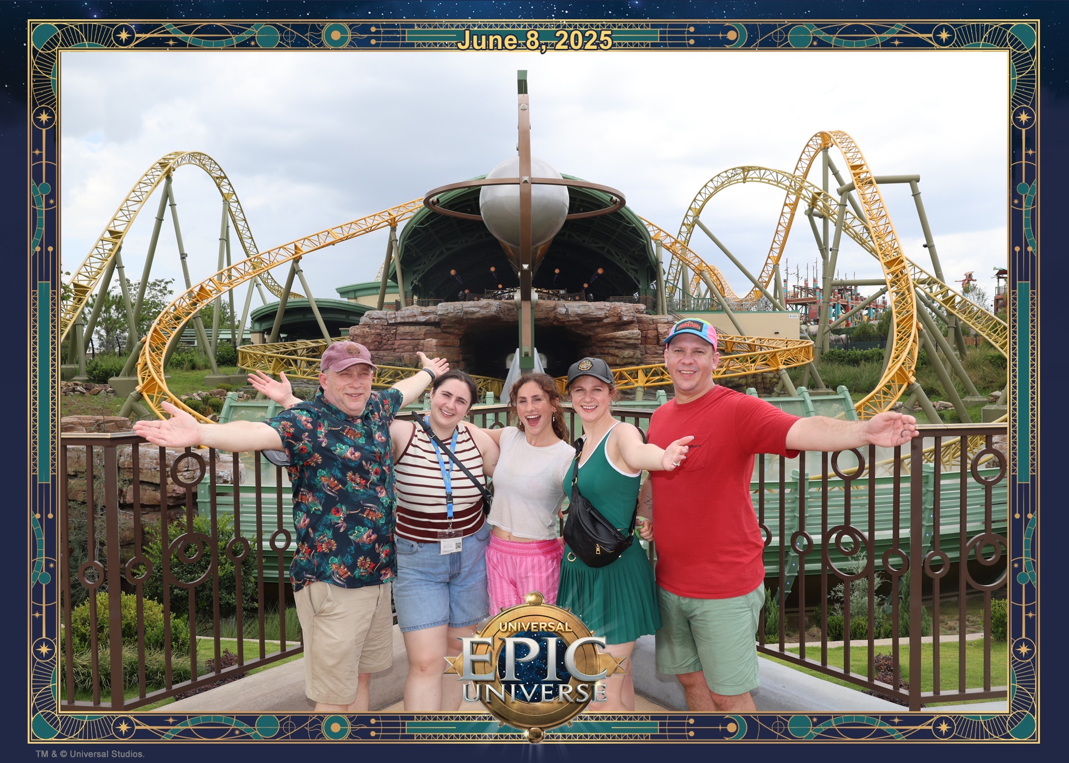 Family posing with arms outstretched in front of the Stardust Racers coaster at Universal Epic Universe on June 8, 2025